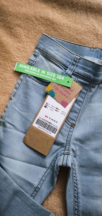 Nowe spodnie jeansowe coccodrillo r. 92