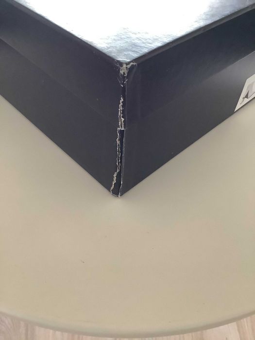 Botas em pele (preto e branco)