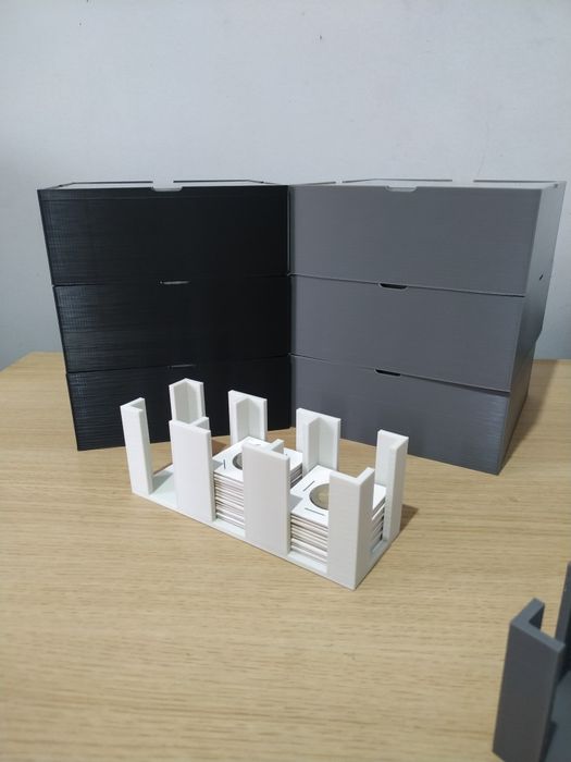 Suportes organizadores para moedas em alvéolos