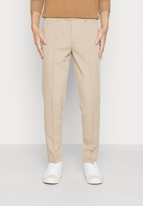 Spodnie chinosy beżowe Lindbergh M