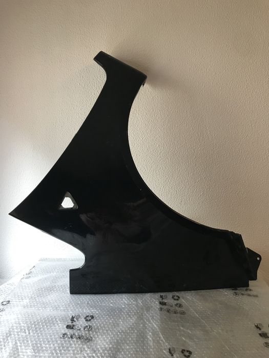 Guarda lamas esquerdo mitsubishi colt