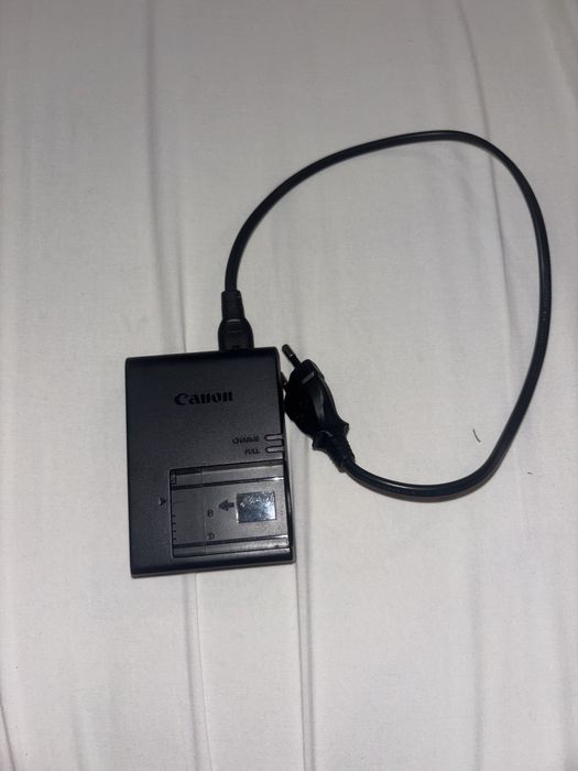 ítulo: Canon EOS R50 como nova + lente 18–45mm – 680€