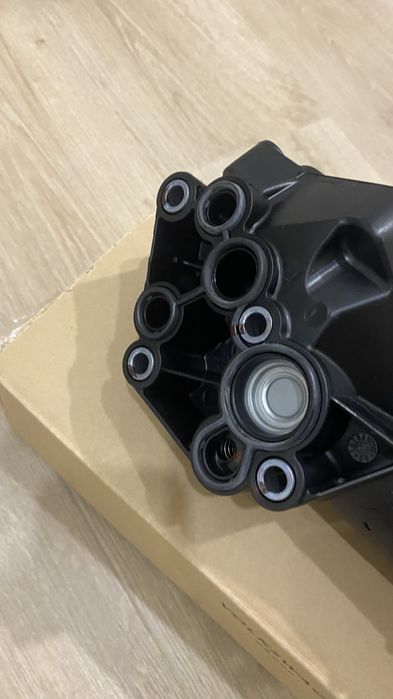 Кронштейн (корпус) масляного фільтра 2.5 vw 07K115397D / 07K115397Е