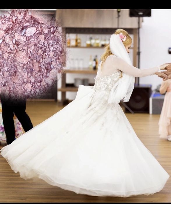 Suknia ślubna Justin Alexander regulowana przez wiązanie gorsetowe