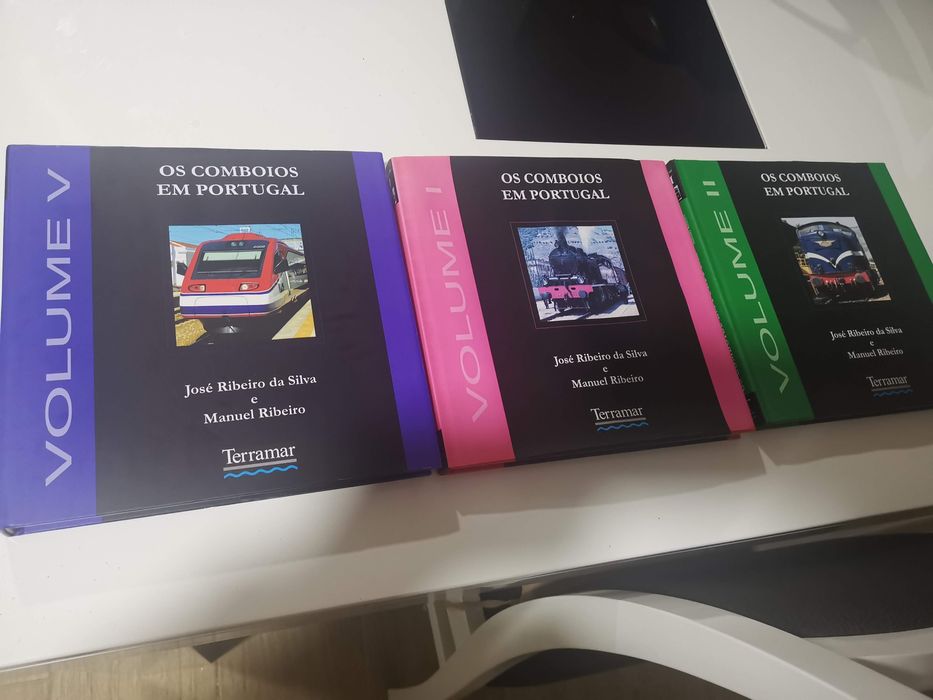 Vagons e livros ferroviarios novos