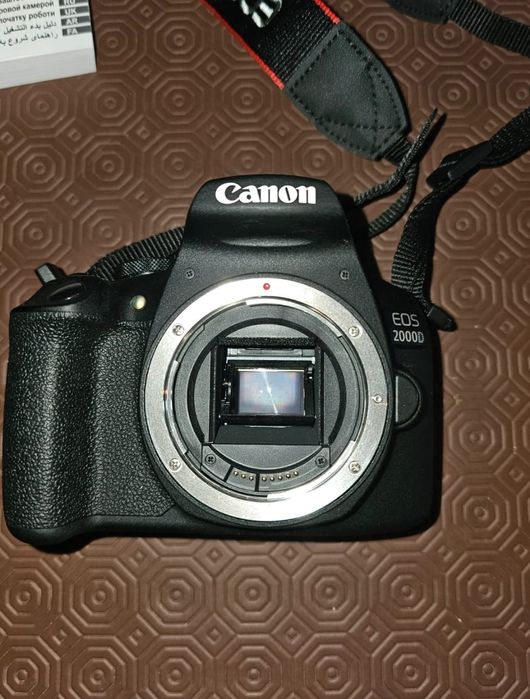 Câmara CANON EOS 2000D + Objectiva EF-S 18/55mm f/3.5 - 5.6 ll + saco