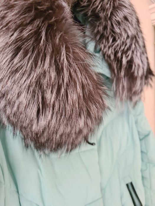 Пуховик в ідеальному станні