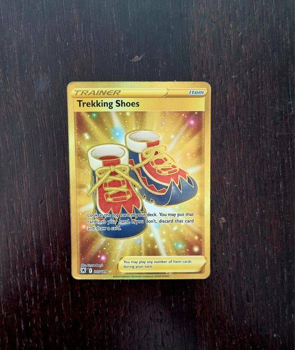 Karta Pokemon Trainer Trekking Shoes Gold 215/189 Olsztyn  OLX.pl