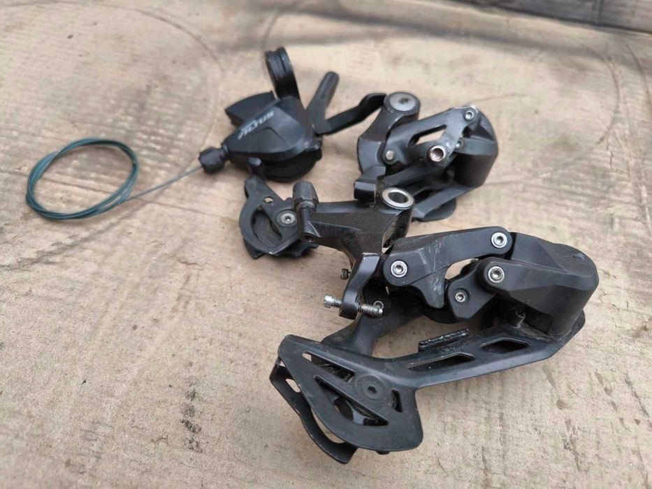 Переключатель скоростей Shimano Acera, Altus, Cues