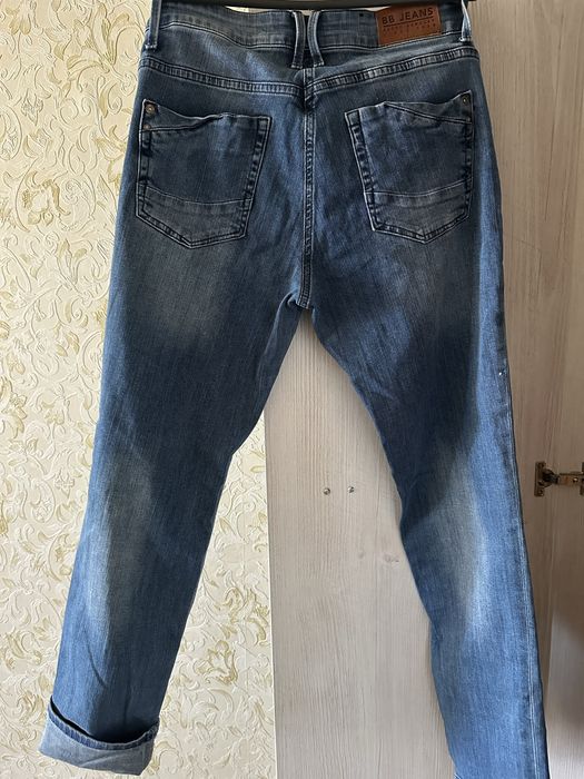 Женские джинсы