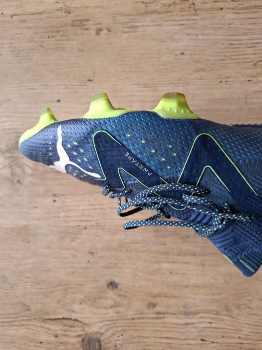 chuteiras Puma future FG/AG