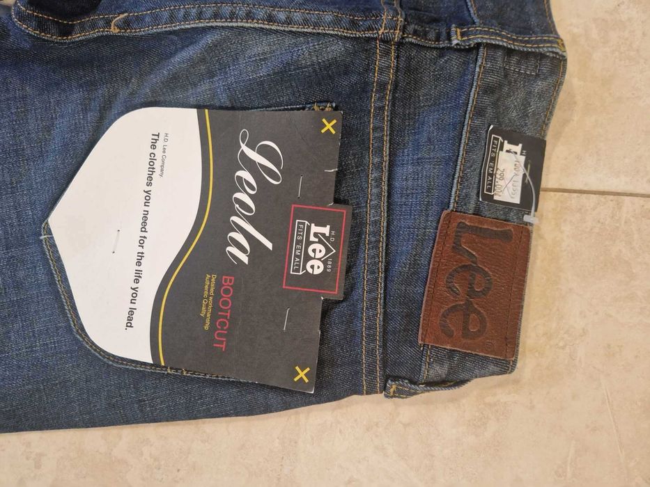 Nowe damskie spodnie jeansowe LEE dzwony rozmiar W26 L32