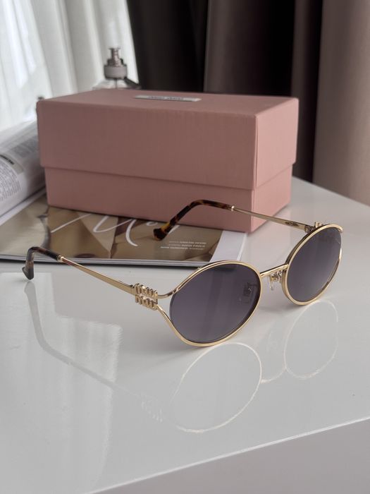 Окуляри Miu Miu Blue/Gold SMU52Y F05D1 55/20/130