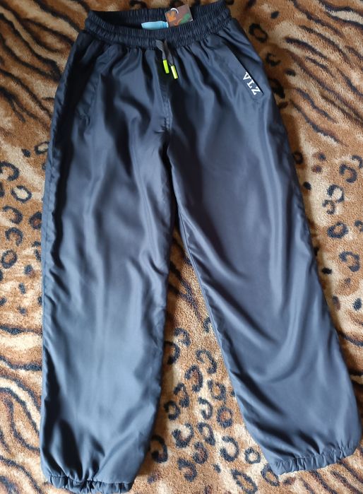 Штаны теплые 8-9 лет