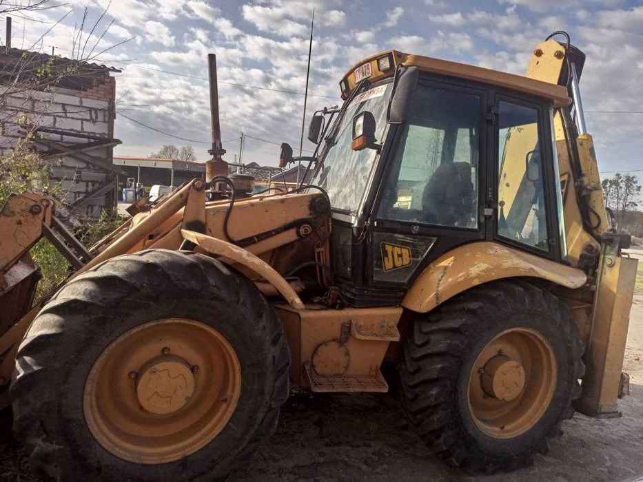 Экскаватор  погрузчик JCB 4