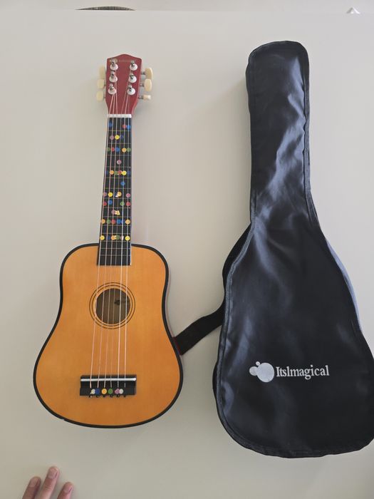 Guitarra acustica Criança