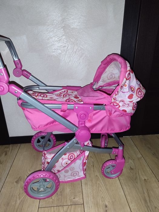 Коляска з іграшками