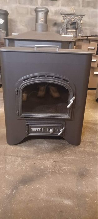 Vendo salamandra com forno em cima para cozinhar muito boa