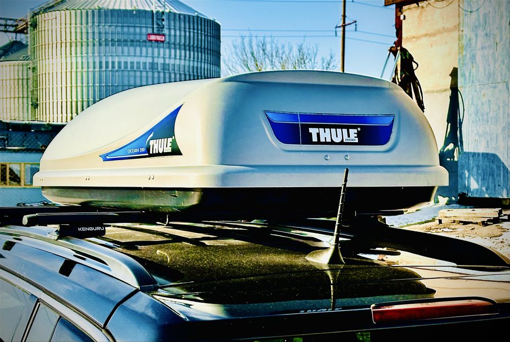 Продам бокс на кришу Thule Ocean 200 стан нового.