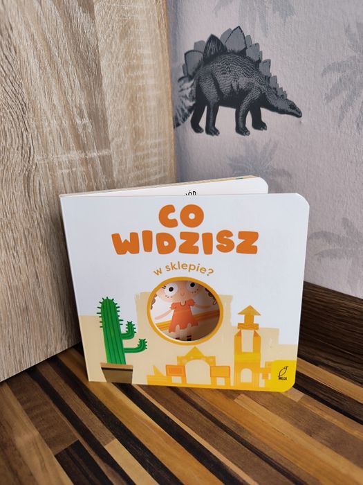 Co widzisz ? W sklepie książeczka z wyciętymi okienkami
