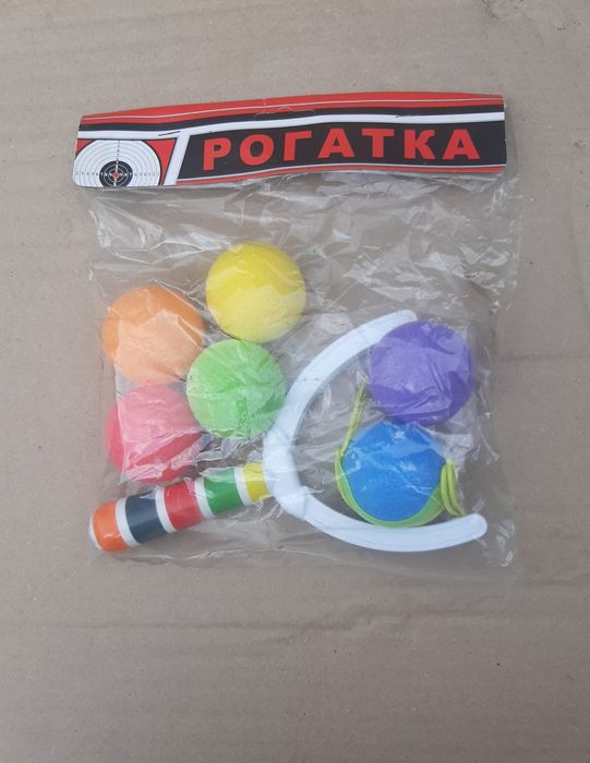 Игра для детей рогатка с мячиками