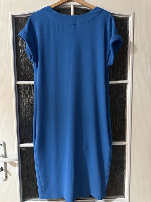 Niebieska sukienka chabrowa z kieszeniami elastyczny materiał 36 S