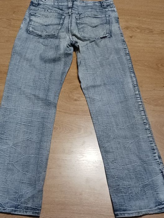 39* Spodnie męskie rozmiar 32 firmy Trang