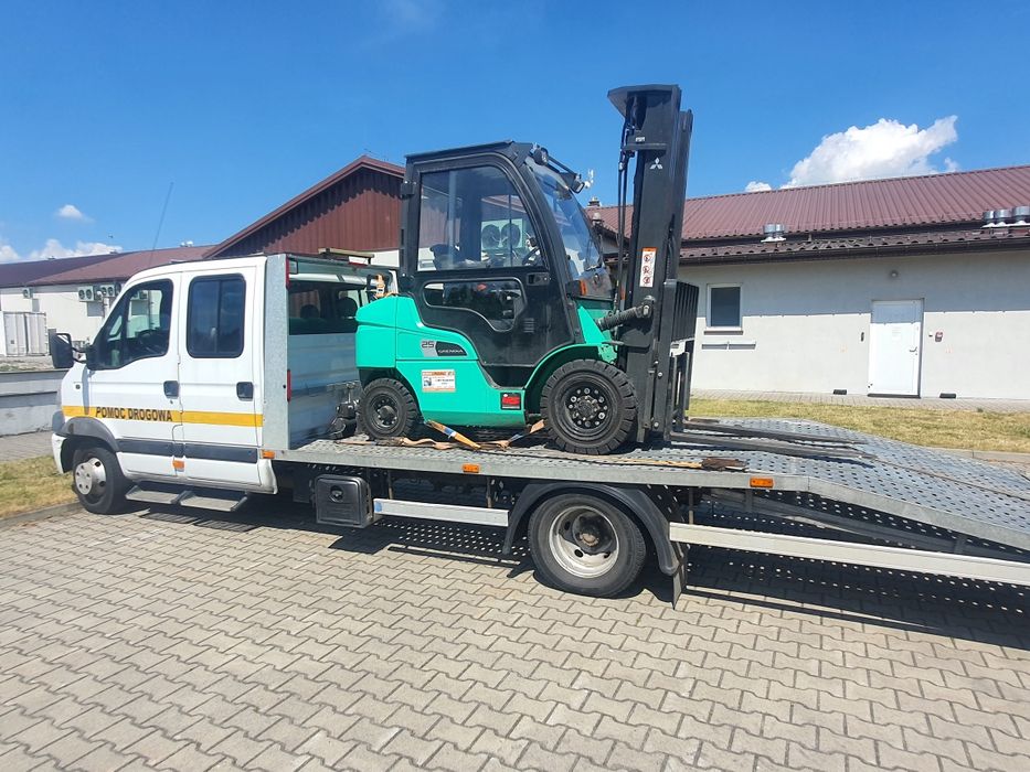 Pomoc drogowa laweta +6 osób transport 6.5tony