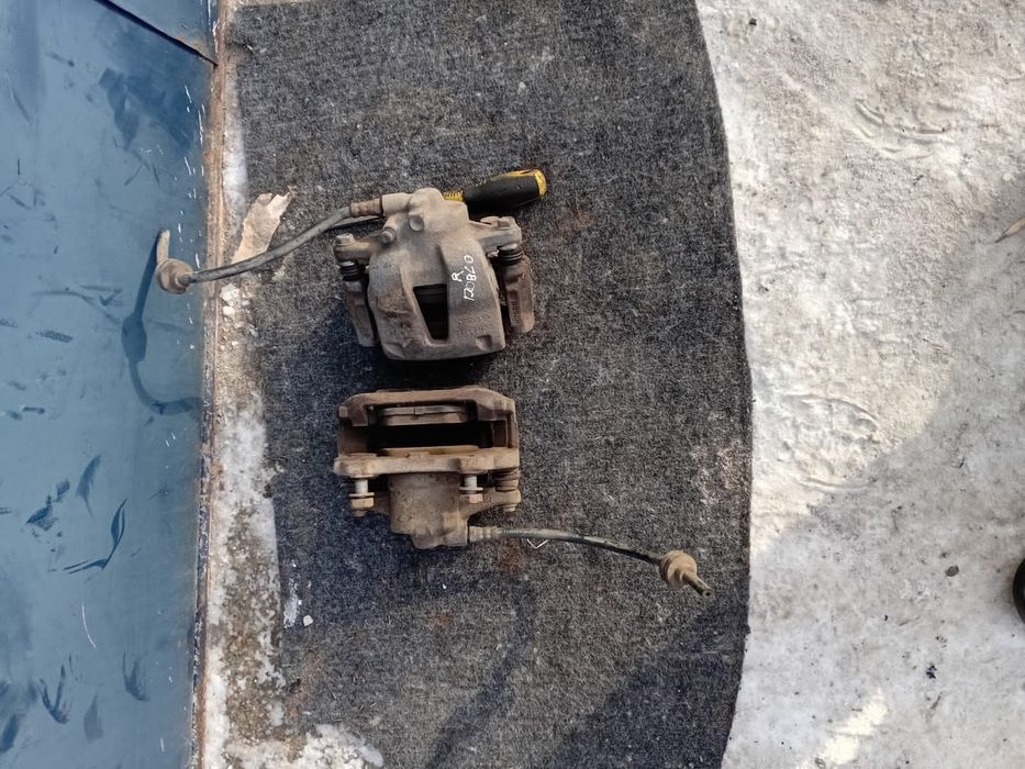 Передние суппорта Fiat Doblo 2008