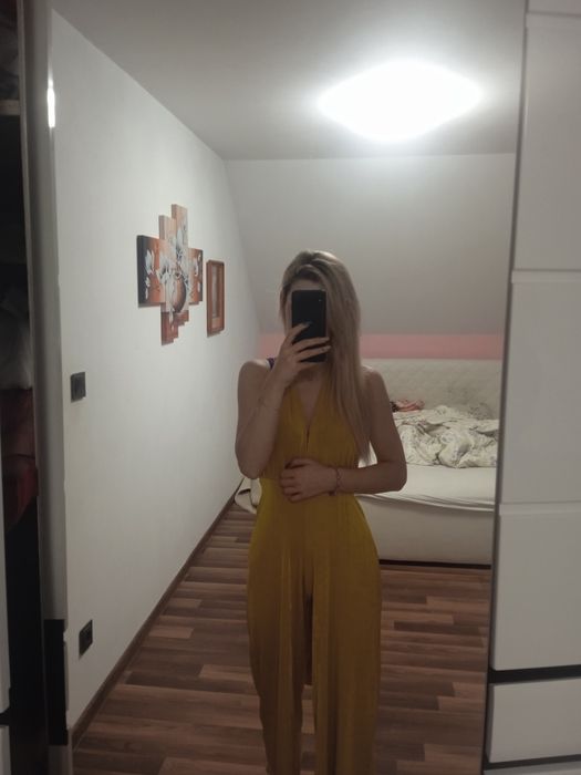 Kombinezon dekolt głęboki błyszczący mieniący sylwester XS s imprezowy