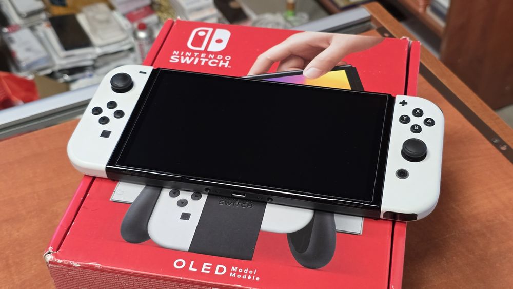 Konsola Nintendo Switch OLED biała, stan bdb