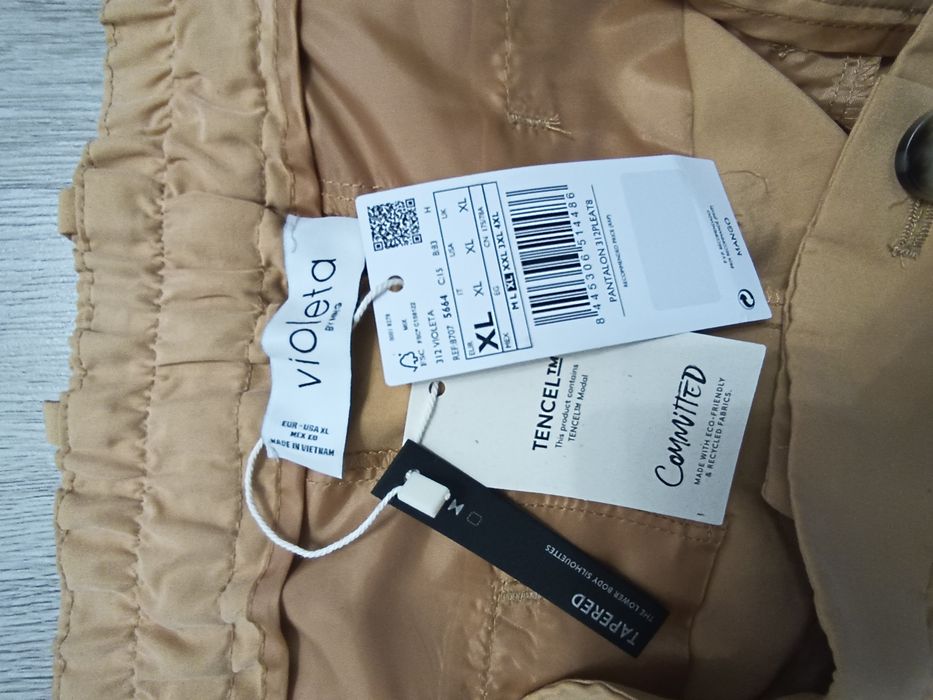 Фирменные брюки Mango