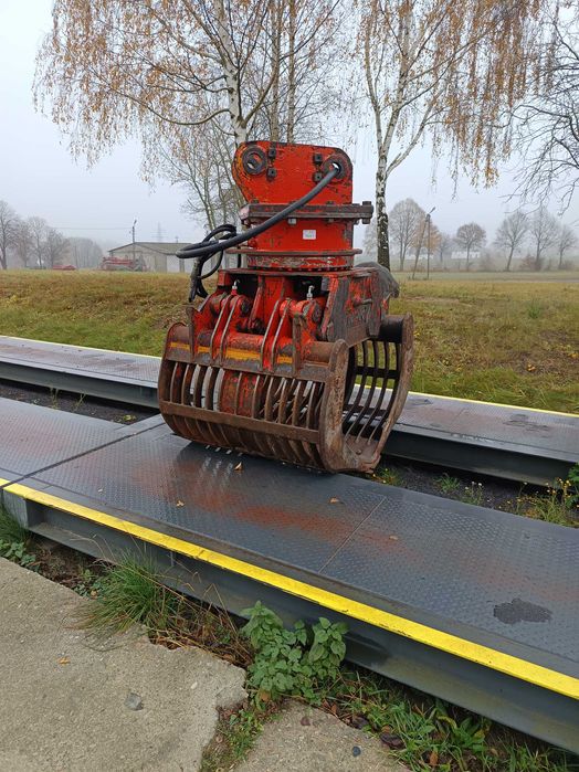 Obrotowy chwytak wyburzeniowo- sortujący