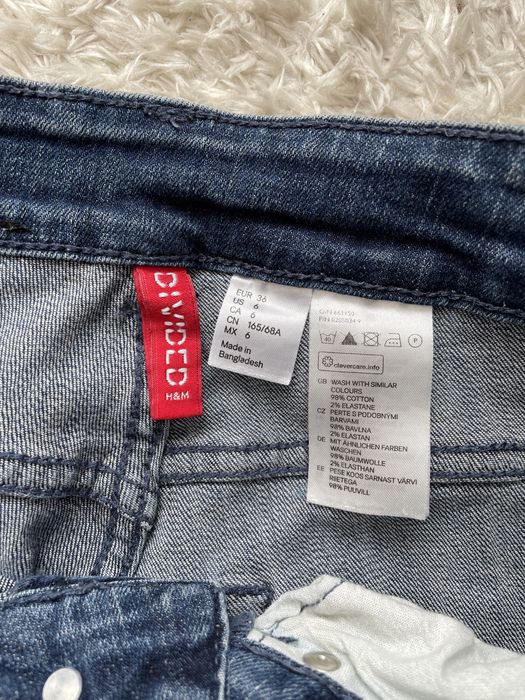 Jeansy ciemne rurki H&M divided dziury przetarcia S/36