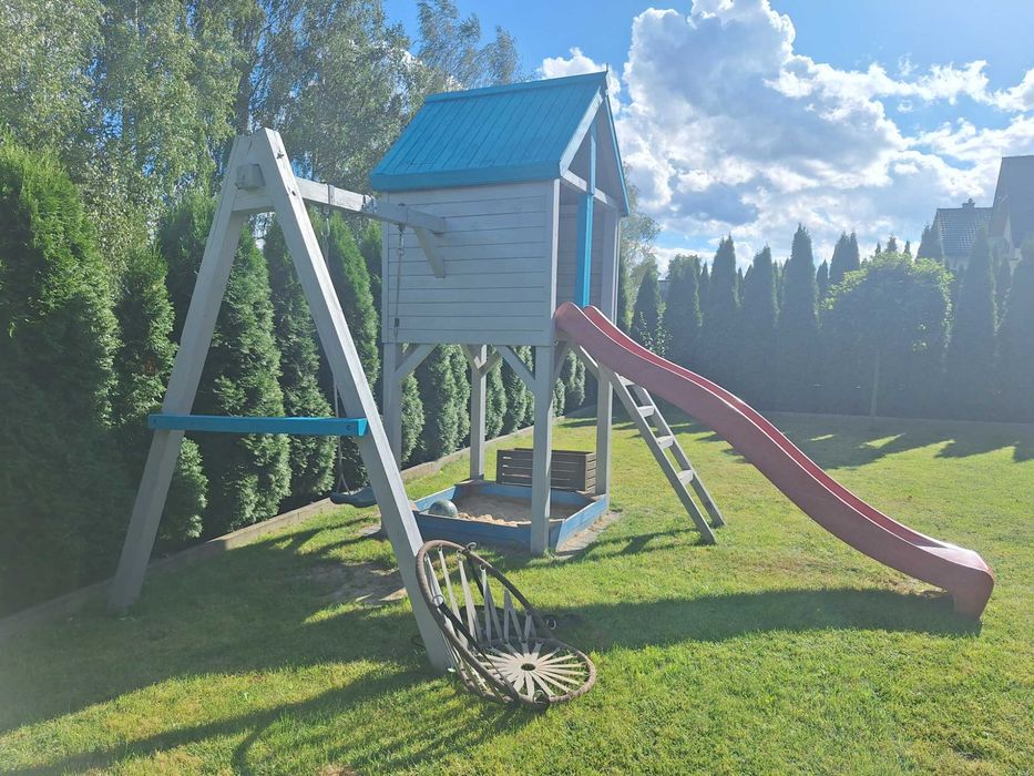 Domek dla dzieci plac zabaw zjeżdżalnia huśtawki