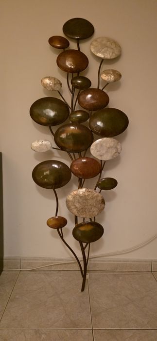 Peça decorativa de metal