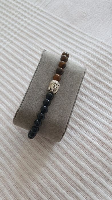 Pulseira em olho de tigre com buda