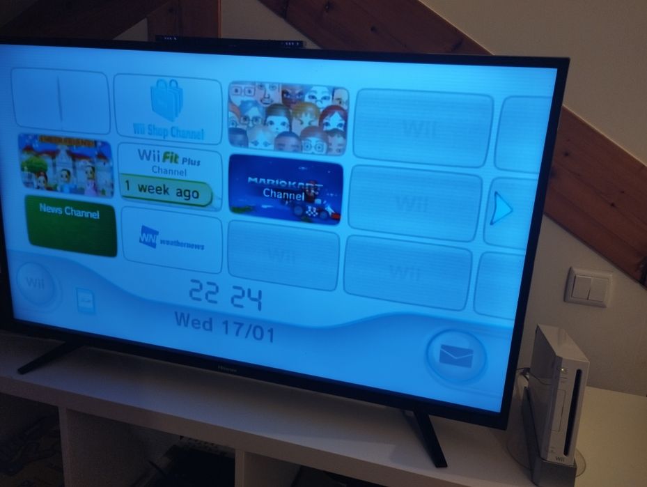 Nintendo Wii com comando acessórios, balança e 3 jogos