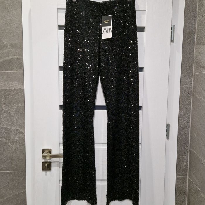 Cekinowe spodnie dzwony Zara M nowe