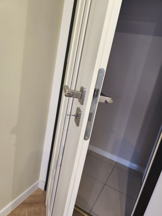 Drzwi wewnętrzne Voster+ klamki Inox