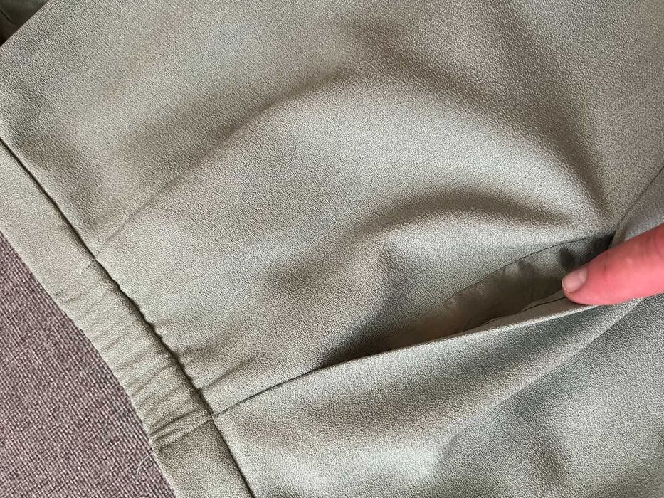 Zielonkawa garsonka firmy SUITSME