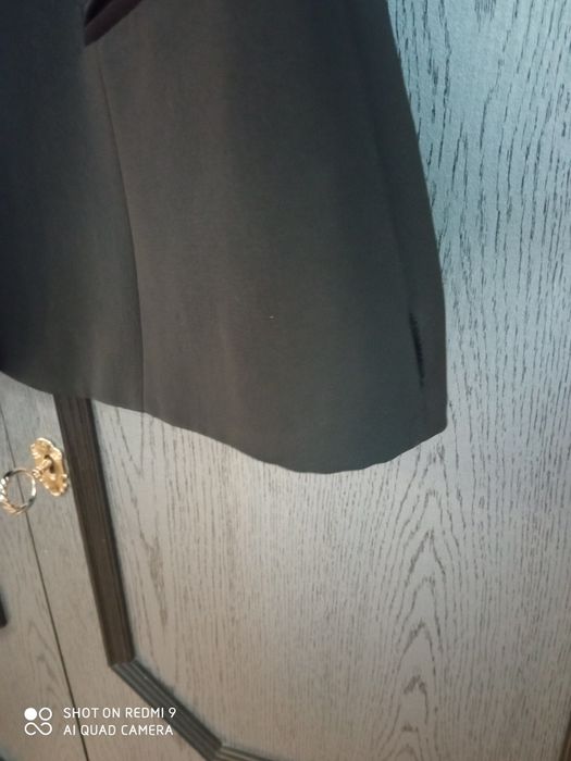 Czarny, elegancki żakiet.