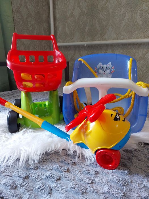 Дитячий  іграшка візок,гойдалка,іграшка -каталка.
