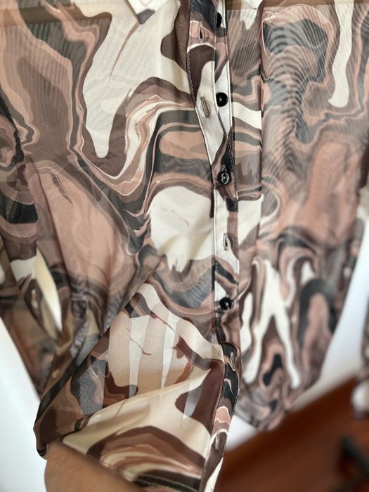 Camisa semi transparente