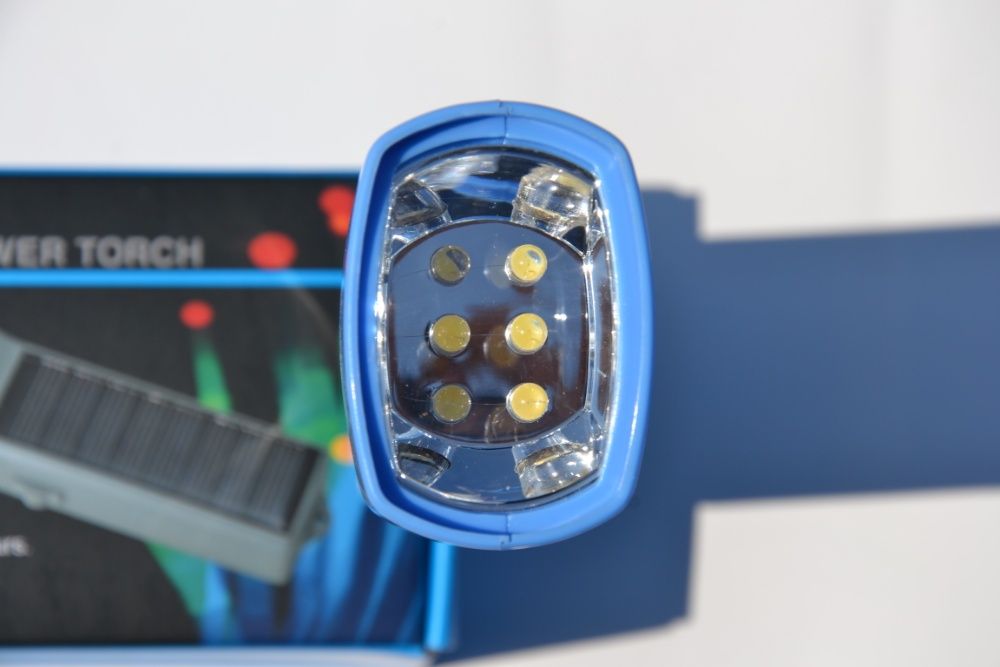 Фонарь. Фонарик на солнечной батареи+зарядное