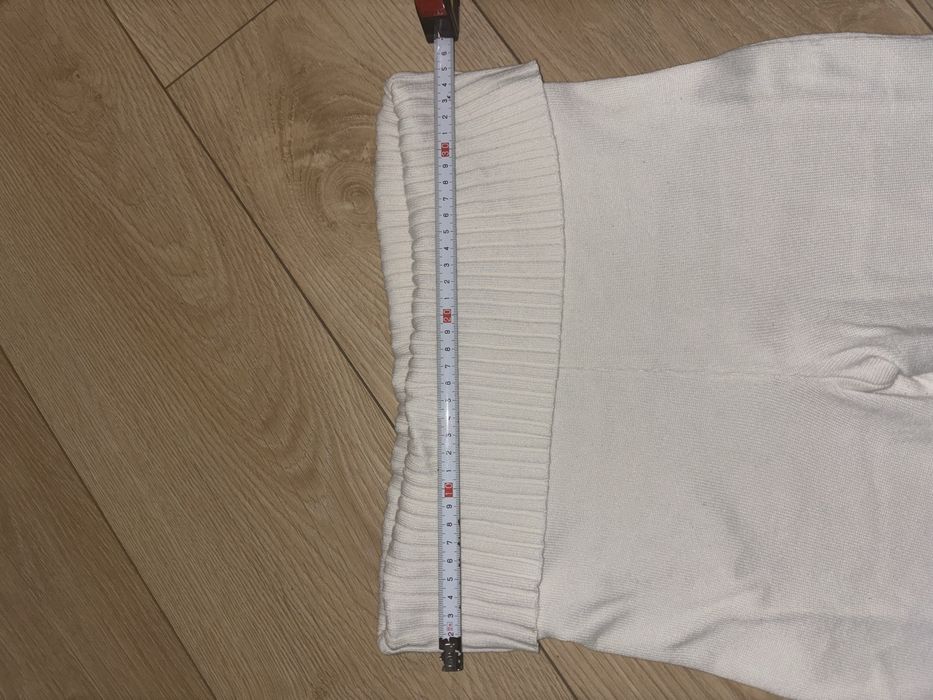 Białe kremowe spodnie z szerokimi nogawkami dzwony sweterkowe xs H&M