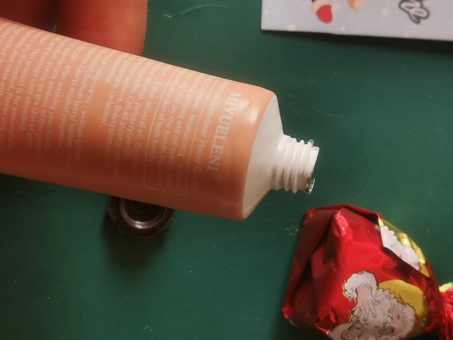 Creme de mãos, separador de livros