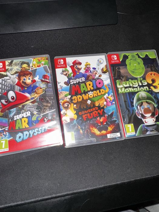 Nintendo Switch + Acessorios + 4 Jogos