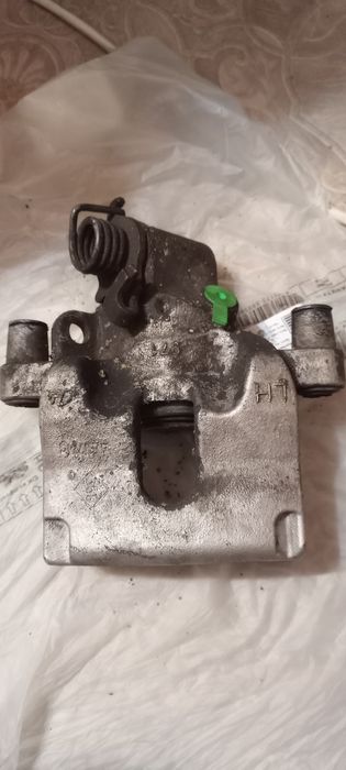 Супорти задні авт. ручника Лагуна 3