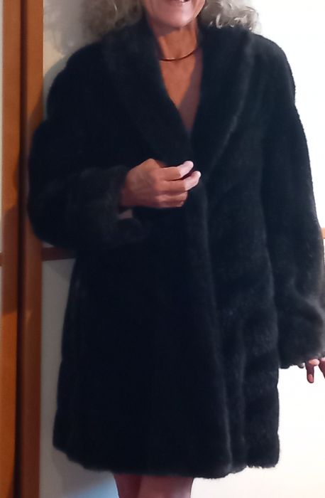 Casaco preto , tamanho  M. Imitação pele